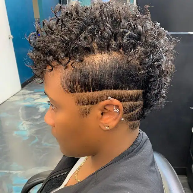 Mohawk cut + side lines + curls